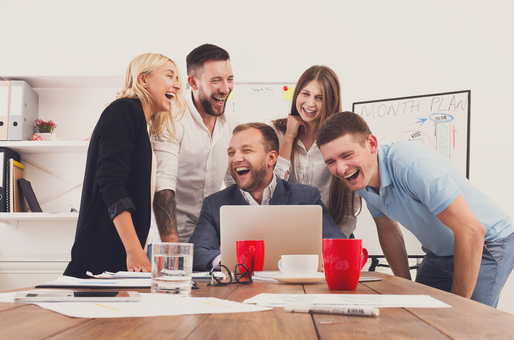 Illustration of team members collaborating on workplace habit program planning